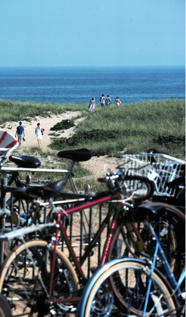 Bikes and ocean view near surfside beach on Nantucket Island.