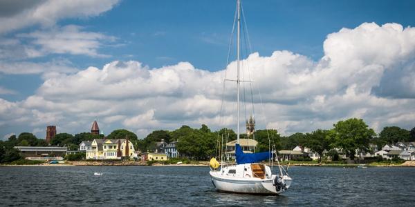 A small sailboat moored in the harbor at Fairhaven, Massachusetts. 