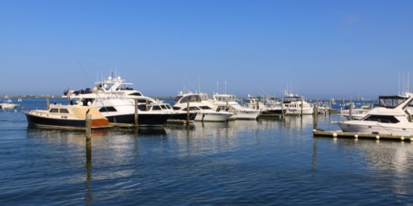 A view of boats moored at Plymouth Harbor, Plymouth, MA